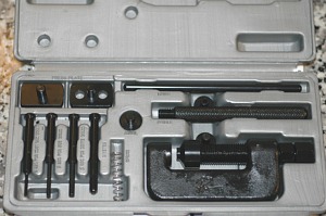 Motion Pro motorcycle chain tool kit, including chain breaker, chain side plate press and master link rivet attachment